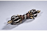 A BRONZE AND SILVER VAJRA