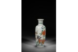 A CHINESE FAMILLE VERTE 'QILIN AND FLOWERS' VASE