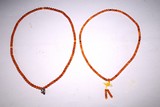 TWO AMBER BEAD NECKLACES