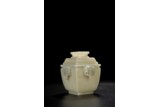 A CHINESE WHITE JADE ARCHAISTIC VASE AND COVER