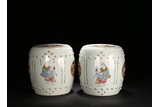 A PAIR OF FAMILLE ROSE 'FIGURES‘ DRUM STOOLS
