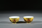 A PAIR OF YELLOW GLAZED BOWLS