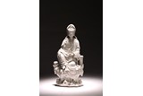A CHINESE BLANC-DE-CHINE FIGURE OF GUANYIN