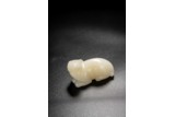 A CHINESE WHITE JADE CARVED MYTHICAL BEAST 