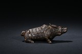A CLAY FIGURE OF BUFFALO