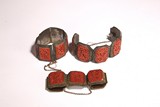 THREE CINNABAR LACQUER BRACELETS