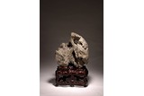 CHINESE TAIHU SCHOLAR'S ROCK WITH ROSEWOOD STAND