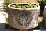 A LARGE CHINESE STONE GARDEN AQUARIUM FISH TANK