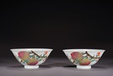 A PAIR OF CHINESE FAMILLE ROSE 'PEACH AND BAT' BOWLS