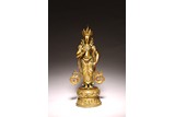A LARGE GILT BRONZE OF STANDING BODHISATTVA
