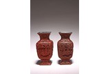 A PAIR OF CINNABAR LACQUER 'FIGURES' VASES