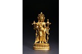 A GILT-BRONZE FIGURE OF STANDING BODHISATTVA