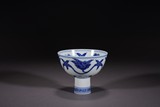 A CHINESE BLUE AND WHITE FLORAL STEM CUP