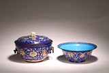 TWO CHINESE CANTON ENAMEL 'BUDDHIST MOTIFS' BOWLS