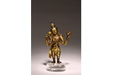 A GILT BRONZE FIGURE OF STANDING BODHISATTVA