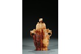 A JADE CARVED VASE AND COVER