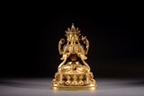 A GILT BRONZE FIGURE OF AVALOKITESHVARA