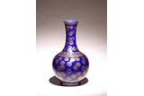 A CHINESE BLUE GLAZED GILT PAINTED MEDALLION VASE