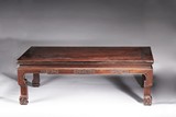A LARGE CHINESE CARVED HARDWOOD LOW TABLE, KANG