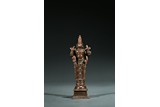 A COPPER ALLOY FIGURE OF STANDING SHIVA