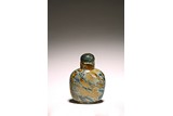 A CHINESE MOSS AGATE CARVED SNUFF BOTTLE