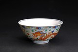 A CHINESE FAMILLE ROSE 'DRAGON AND PHOENIX' BOWL