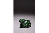 A CHINESE GREEN JADE CARVED BEAST PAPERWEIGHT