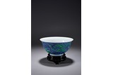 A CHINESE GREEN ENAMEL BLUE GROUND BOWL