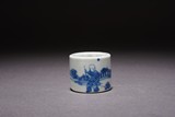 A CHINESE BLUE AND WHITE 'BOY' ARCHER'S RING