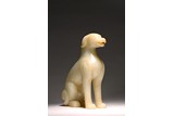 A CHINESE WHITE JADE CARVED FIGURE OF DOG