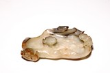 A CHINESE MOTTLED WHITE AND RUSSET LOTUS WASHER