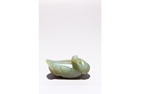 A CHINESE CELADON JADE FIGURE OF GOOSE