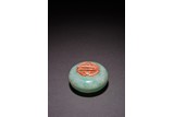 A CHINESE JADEITE CORAL INLAID CIRCULAR INK PASTE BOX