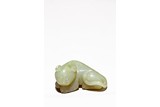 A CHINESE CELADON JADE FIGURE OF TIGER