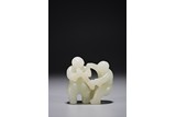A CHINESE WHITE JADE CARVING OF TWIN BOYS