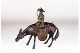 A CHINESE PARCIL GILT 'LAOZI RIDING DONKEY' CENSER