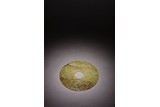 A CELADON JADE 'PHOENIX' DISC BI