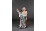 A CHINESE FAMILLE ROSE FIGURE OF TIE GUAILI 