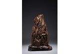 A CHINESE AGARWOOD CARVED 'FIGURES' BOULDER