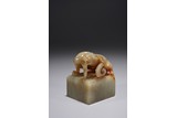 A CHINESE CELADON JADE MYTHICAL BEAST SEAL