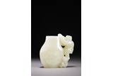 A CHINESE WHITE JADE 'BOY' WATER POT