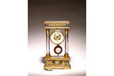A FRENCH ORMOLU BRONZE AND CRYSTAL MANTLE CLOCK