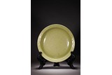 A CHINESE CELADON GLAZED 'FLOWERS' CHARGER