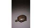 A CHINESE OPAQUE BLACK 'TURTLE' INKSTONE