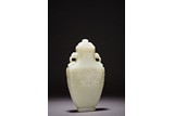 A CHINESE WHITE JADE 'TAOTIE' VASE 