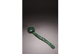 A CHINESE SPINACH GREEN JADE RUYI SCEPTER