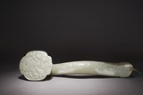 A LARGE CHINESE CELADON 'DRAGON' RUYI SCEPTER