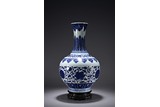 A CHINESE BLUE AND WHITE 'FLOWERS' BOTTLE VASE