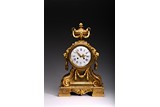 A LOUIS XVI STYLE GILT BRONZE MANTEL CLOCK