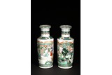 A PAIR OF CHINESE FAMILLE VERTE 'FIGURES' ROULEAU VASES